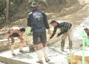 Semangat Kemerdekaan RI Pacu Prajurit TMMD 125, Pembangunan Jalan Rabat Beton dan Plut Duiker Terus Digenjot