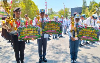Tampil Kompak dan Disiplin, SMAN 1 Limboto Bawa Pulang Dua Piala Lomba PBB HUT TNI