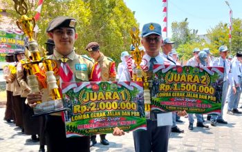 Tampil Kompak dan Disiplin, SMAN 1 Limboto Bawa Pulang Dua Piala Lomba PBB HUT TNI